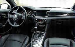 Clean car interior showing dashboard and seats